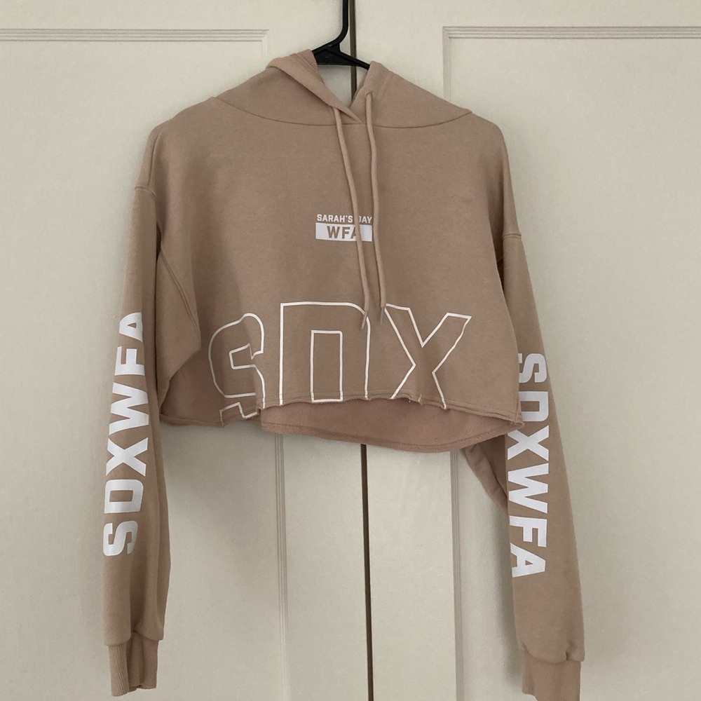 Sarah’s day white fox collection. Nude crop top.